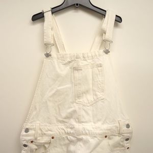 Levi’s white denim overalls